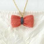 Crochet bow pendant. Coral ..