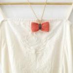 Crochet bow pendant. Coral ..