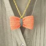 Crochet bow pendant. Coral ..