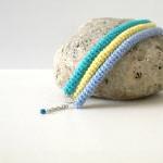 Orbits, crochet bracelet in..