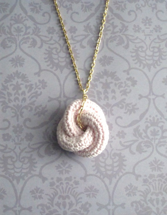 Etarnally. Crochet knot pendant in baby pink.