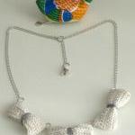 Three crochet bows necklace..