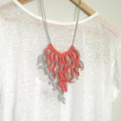 Crochet fringes necklace. Salmon pink and pale grey cotton yarn.