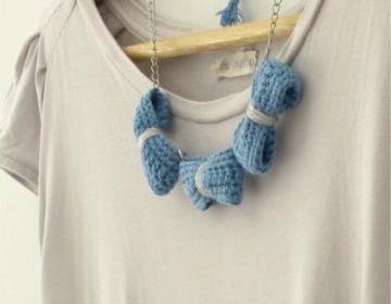Three crochet bows necklace. Pale blue and grey cotton yarn
