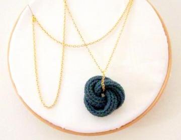 Etarnally. Crochet knot pendant in cypress green